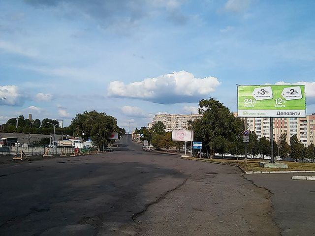 Щит 6x3,  Млинівська вул., (напроти авторинку, АЗС "Укрнафта")
