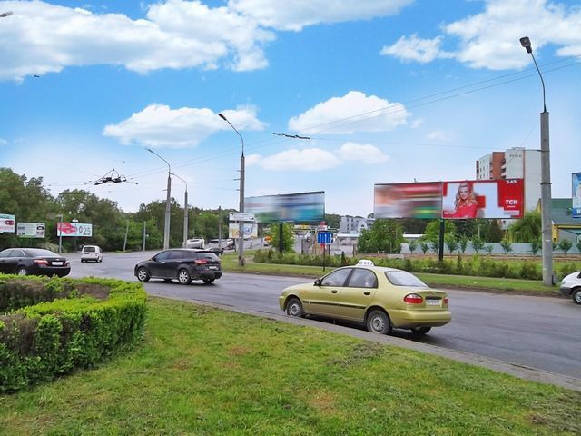 Щит 6x3,  Підволочиське шосе №2 (транспортна розв'язка)(перед  АЗС "WOG", напроти АЗС "ОККО")чебурашка , лівий