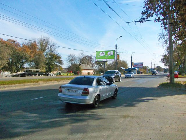 Щит 6x3,  Білопільський Шлях ,18 (ДАЇ) (магазин "Автозапчастини", АЗС "Маршал", АЗС "Авіас") в центр