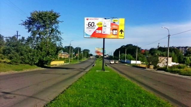 Щит 6x3,  Карпенко-Карого вул., (на міст, розподліьча смуга від  вул. П. Маха)