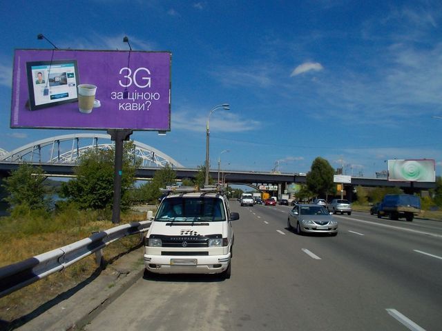 Щит 6x3,  Днепровская набережная ул., 280 м. за мостом "Дарницкий" ( на  Соборности пр.)